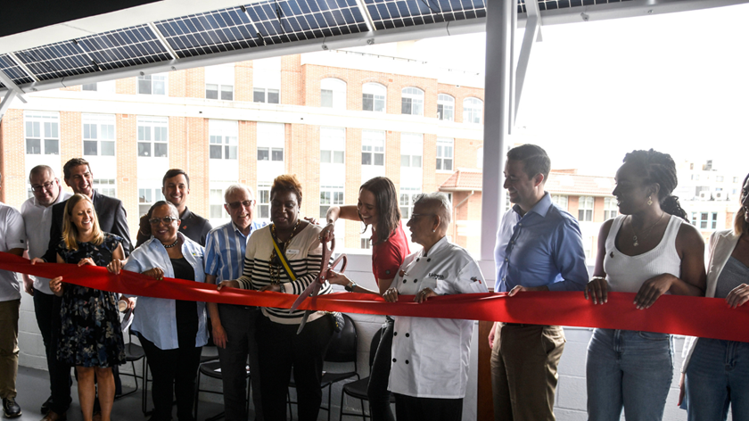 Ribbon-cutting celebration at the Festival Center's solar awning that generates 56,800 kilowatt-hours of energy annually.