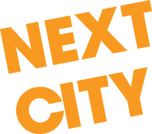Next City logo in orange
