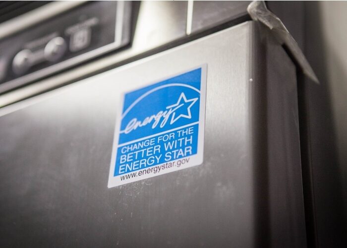 Closeup of an ENERGY STAR logo on a commercial refrigerator.