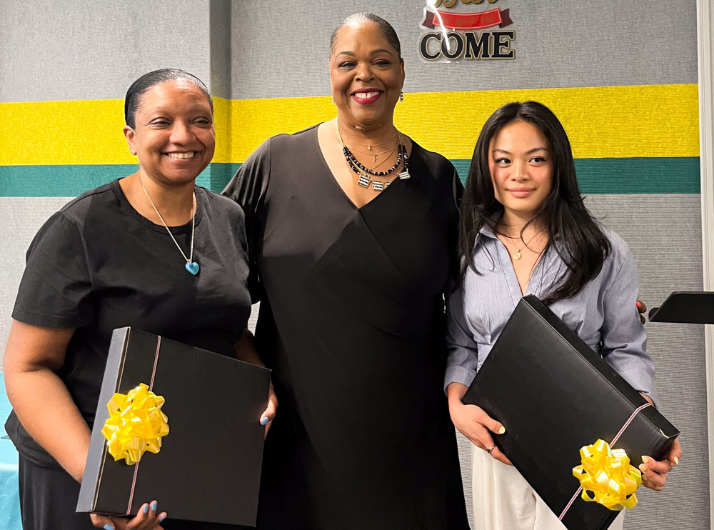 Jamilla Ambush and Belle To receiving their graduation certificates from Manager, Workforce Development, Gleniss V. Brown Wade.