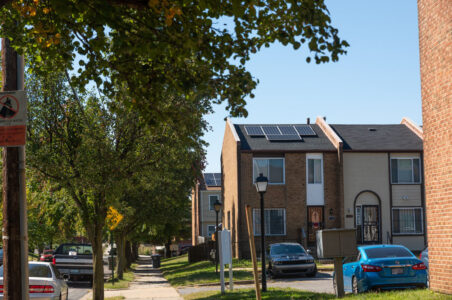 DC neighborhood in Ward 8 with townhomes that have solar panels on the roofs.