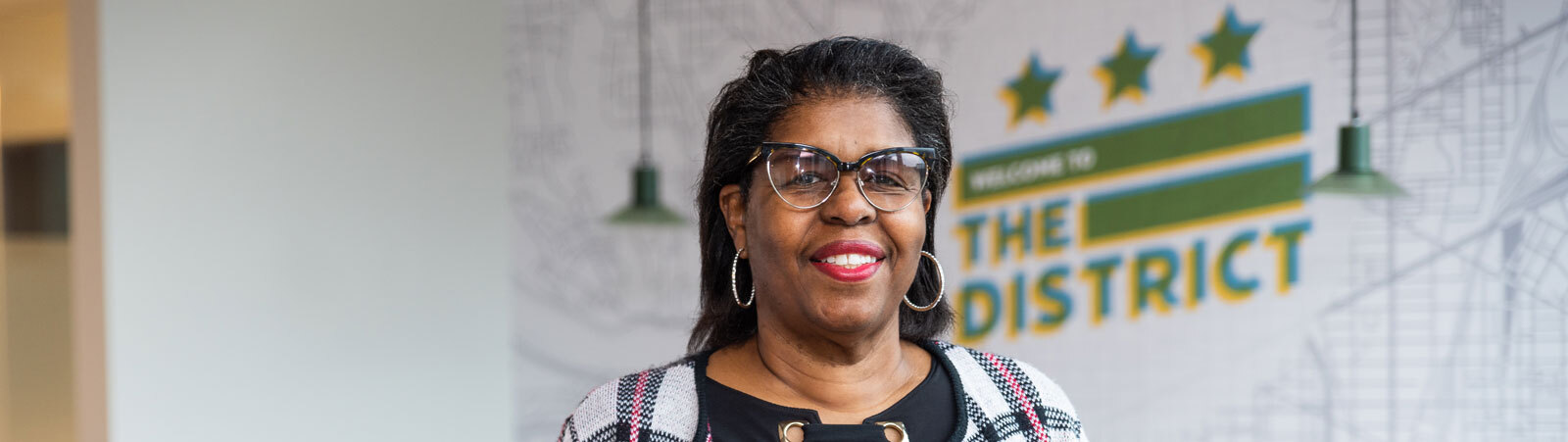 Yolanda Hayden, DCSEU Training Coordinator, smiling in an office setting.