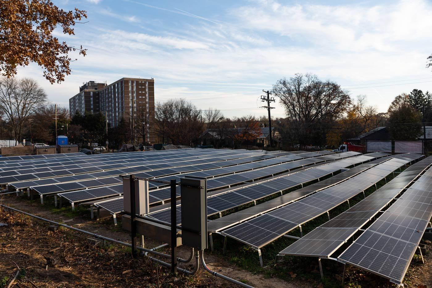 Ground mounted community solar system during sunset at the Fairfax Village Condominiums.