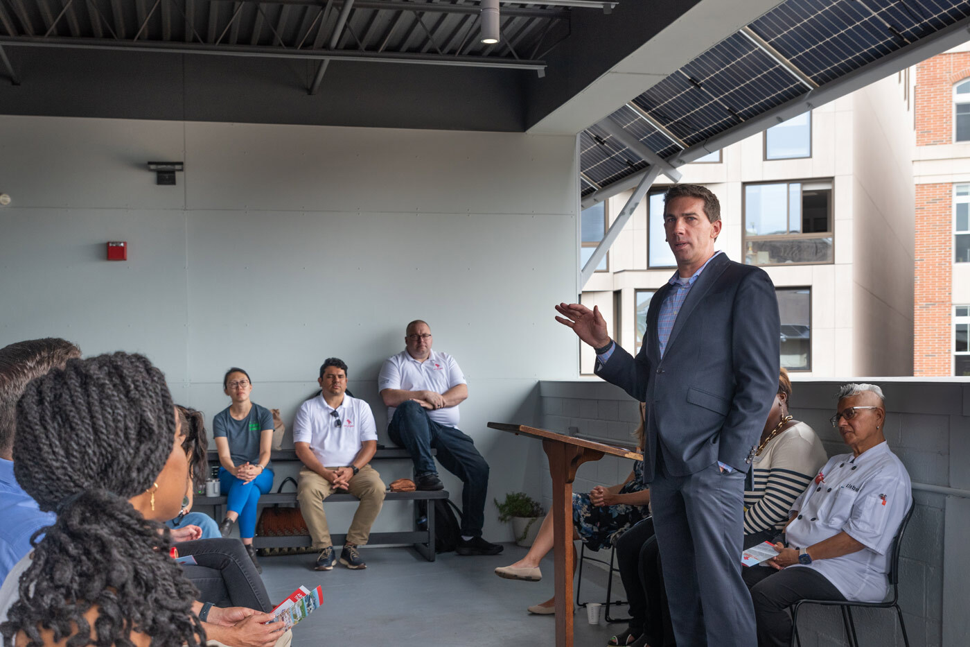 DOEE Deputy Director, Nick Burger, providing remarks at Festival Center solar ribbon cutting.