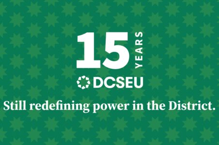Graphic with the 15th anniversary DCSEU logo with lettering the says, "Still redefining power in the District" on a green background with the District flag star pattern.