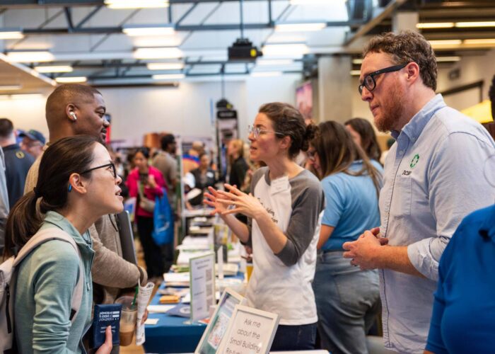 DCSEU Managing Director, Ben Burdick, talking to District residents at the 2026 Healthy Homes Fair.