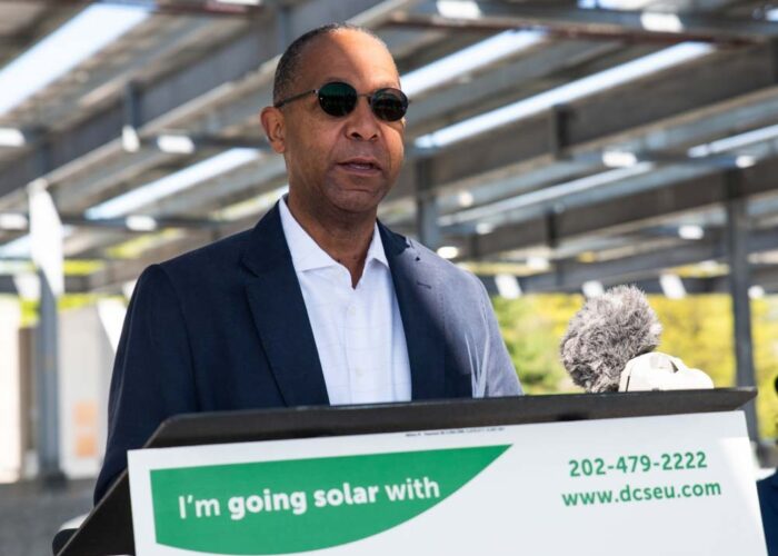 Then DCSEU managing director, Ted Trabue, providing remarks underneath the community solar array canopy at Children's RIC.