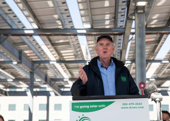 Then DOEE Director, Tommy Wells, providing remarks with the Children's National Research and Innovation Campus solar canopy above him.