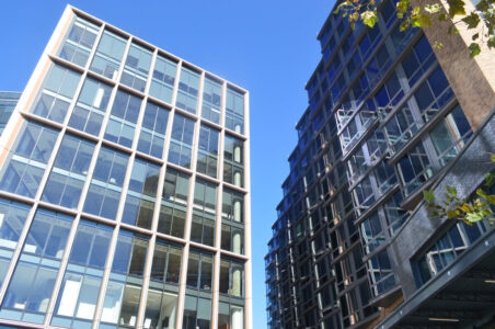 Glass office and multifamily buildings in the Wharf neighborhood in DC.